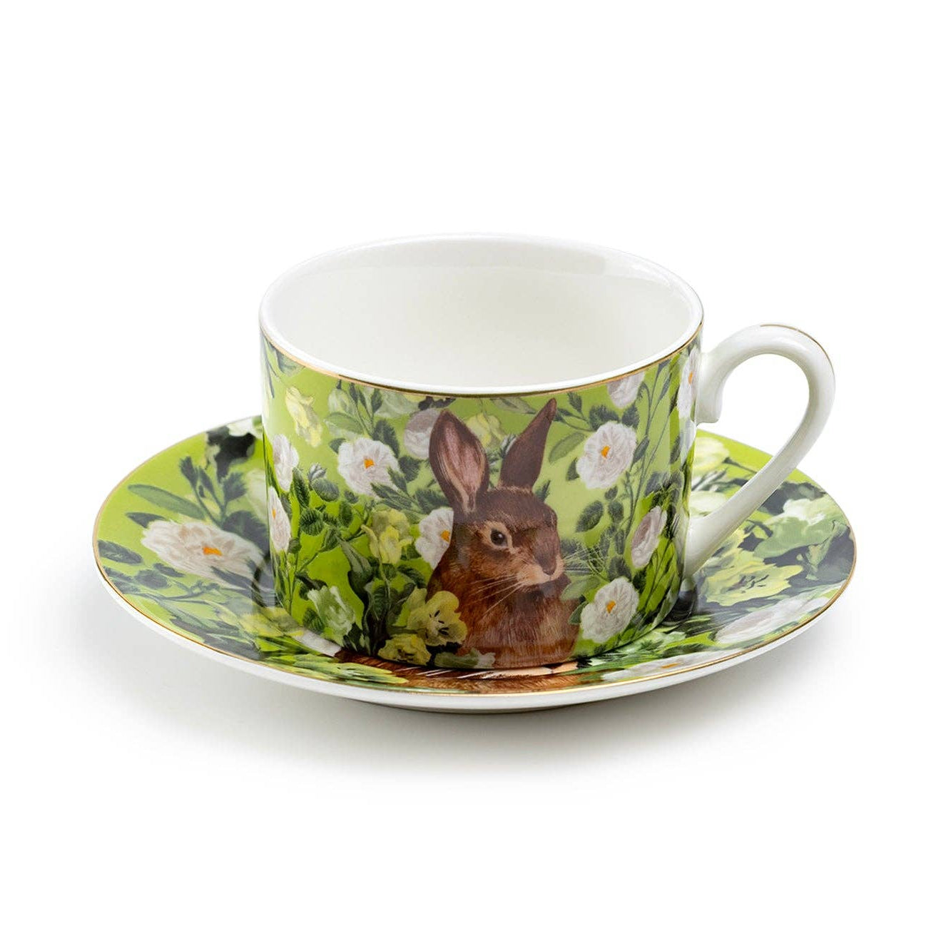Teacup and saucer with rabbit design on a white background