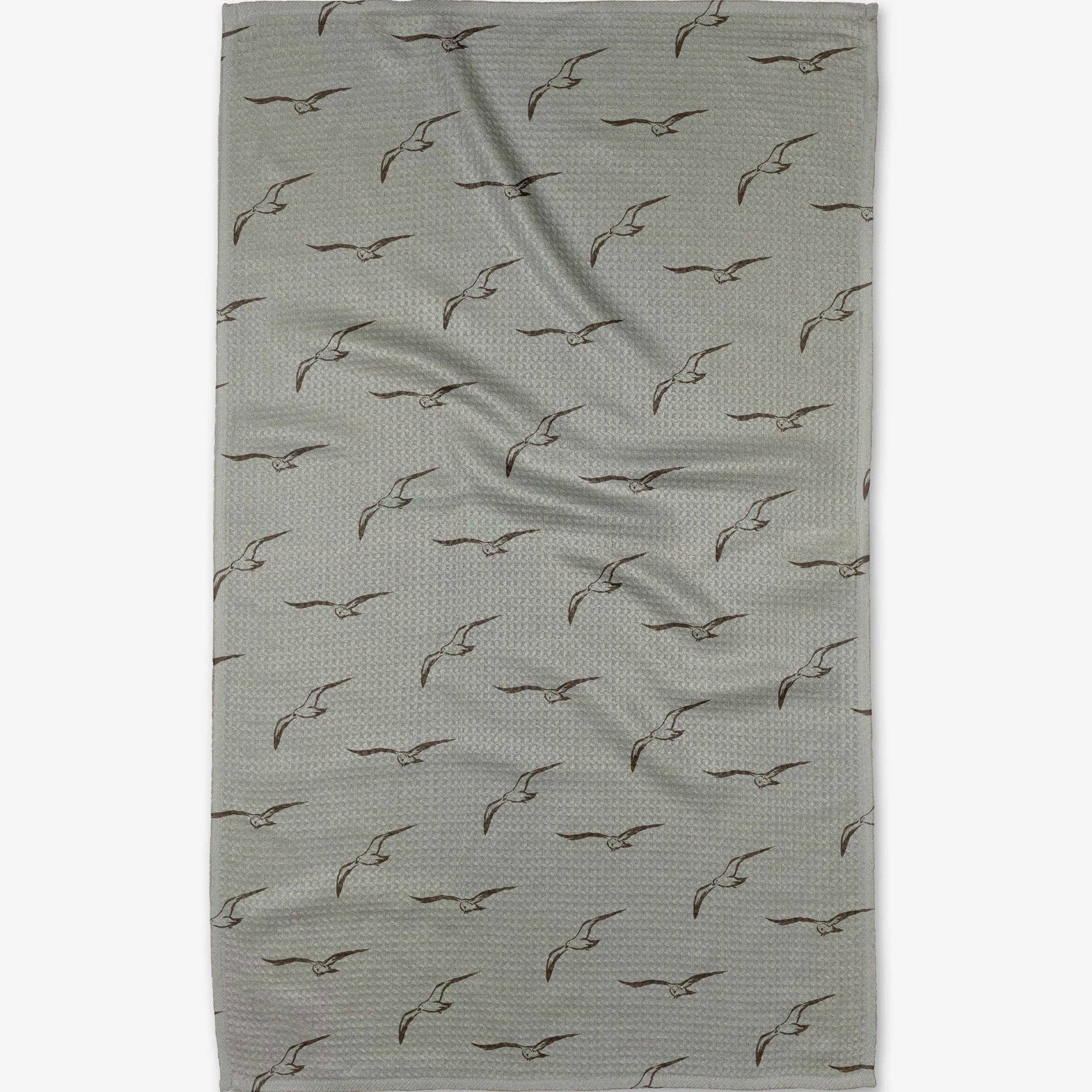 Fabric with bird pattern on a light gray background Tea Towel