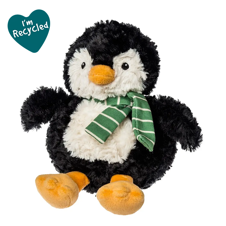 Plush penguin toy with a green scarf and 'I'm Recycled' heart label on a white background