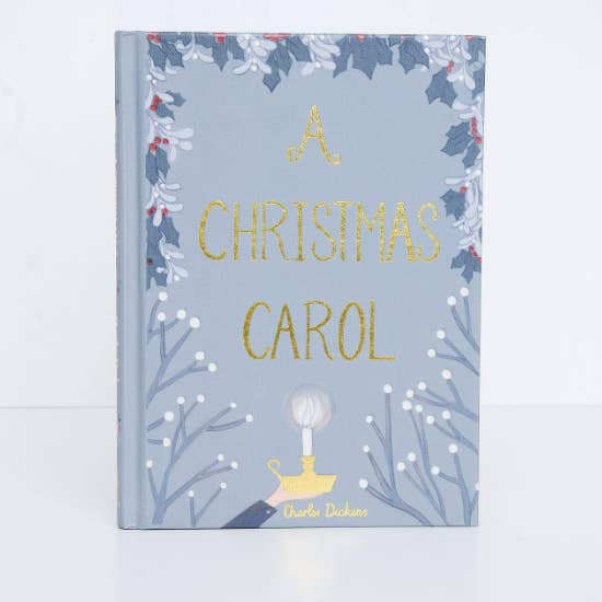 Book cover of 'A Christmas Carol' with decorative elements on a light blue background