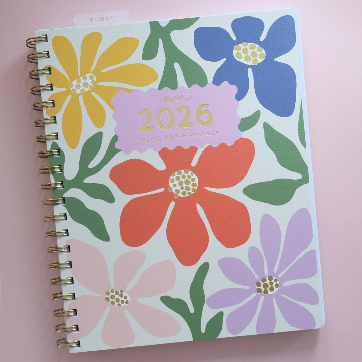 Floral design notebook with '2026' on a pink background