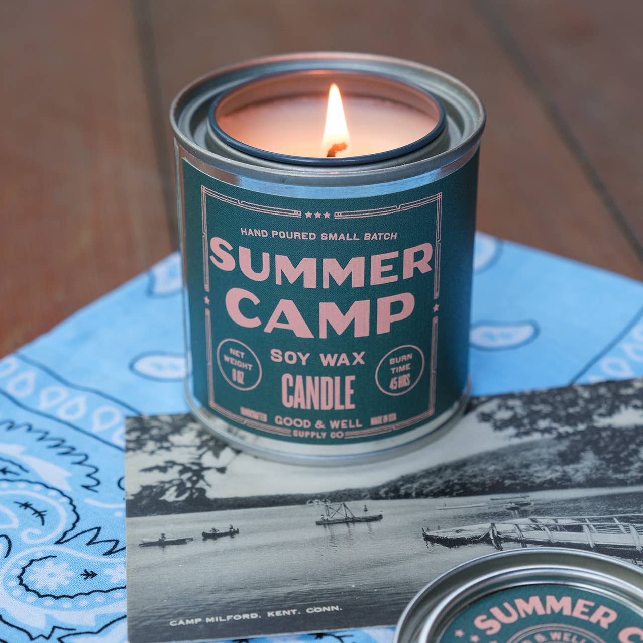Summer Camp candle in a tin can on a map