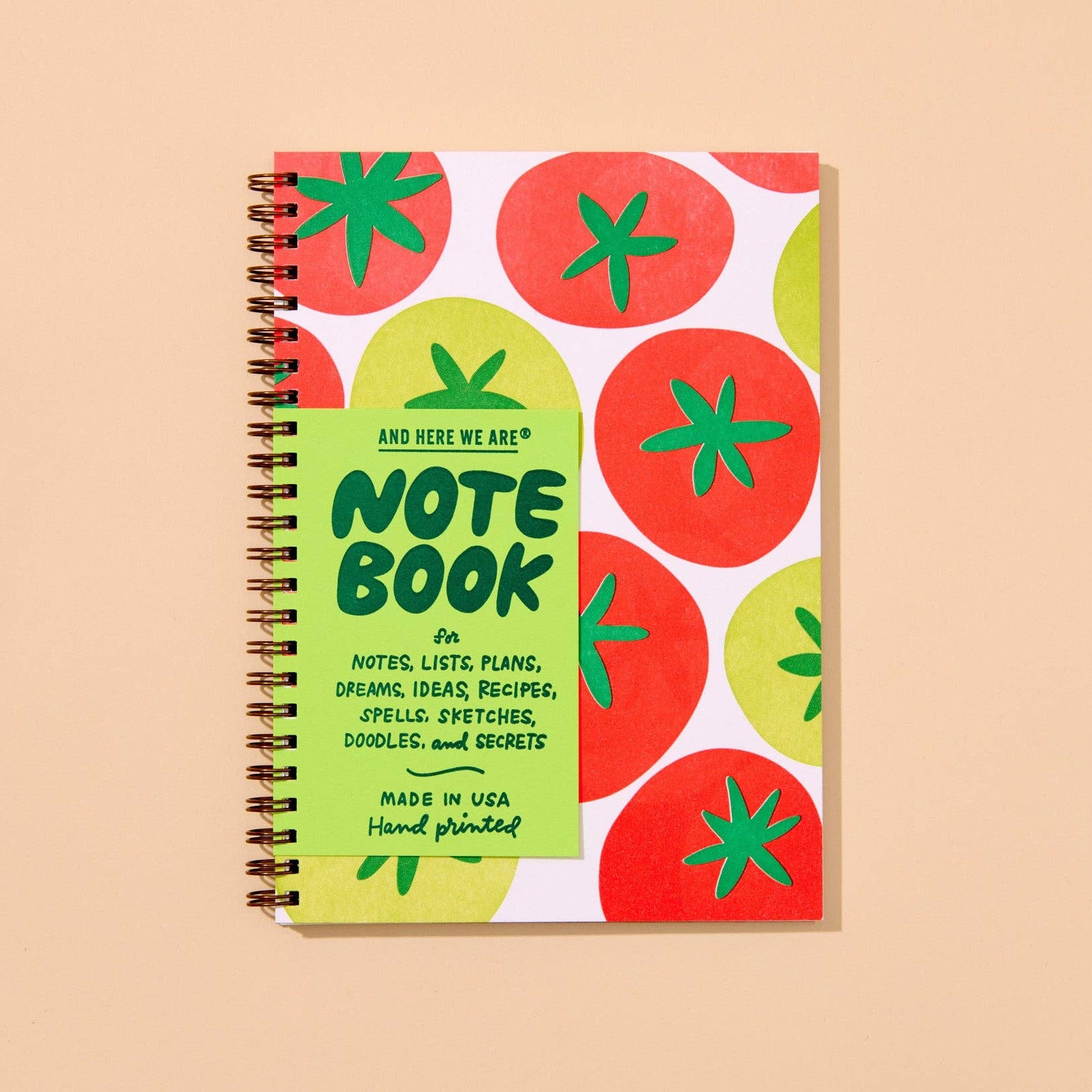 This best selling, hand-printed letterpress A5 spiral-bound notebook features a colorful and vibrant pattern of ripe and green tomatoes in vibrant and neon inks. 48 lined pages, hand printed in Columbus, Ohio, USA.
Details:
Spiral bound notebook with gold colored coil
A5 size (5.8” x 8.25”)