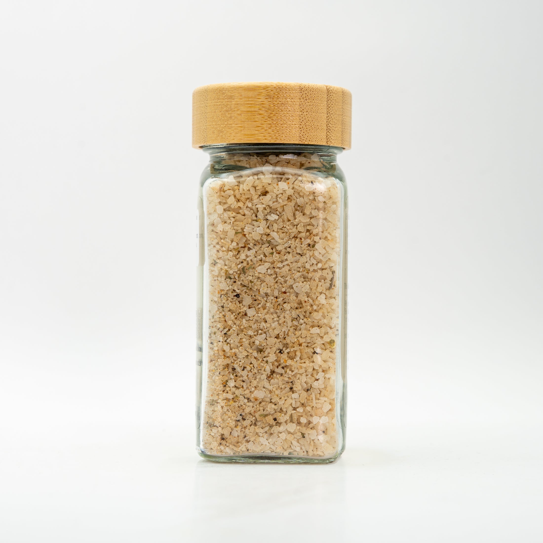 Unlabeled salt jar to show salt color and texture.