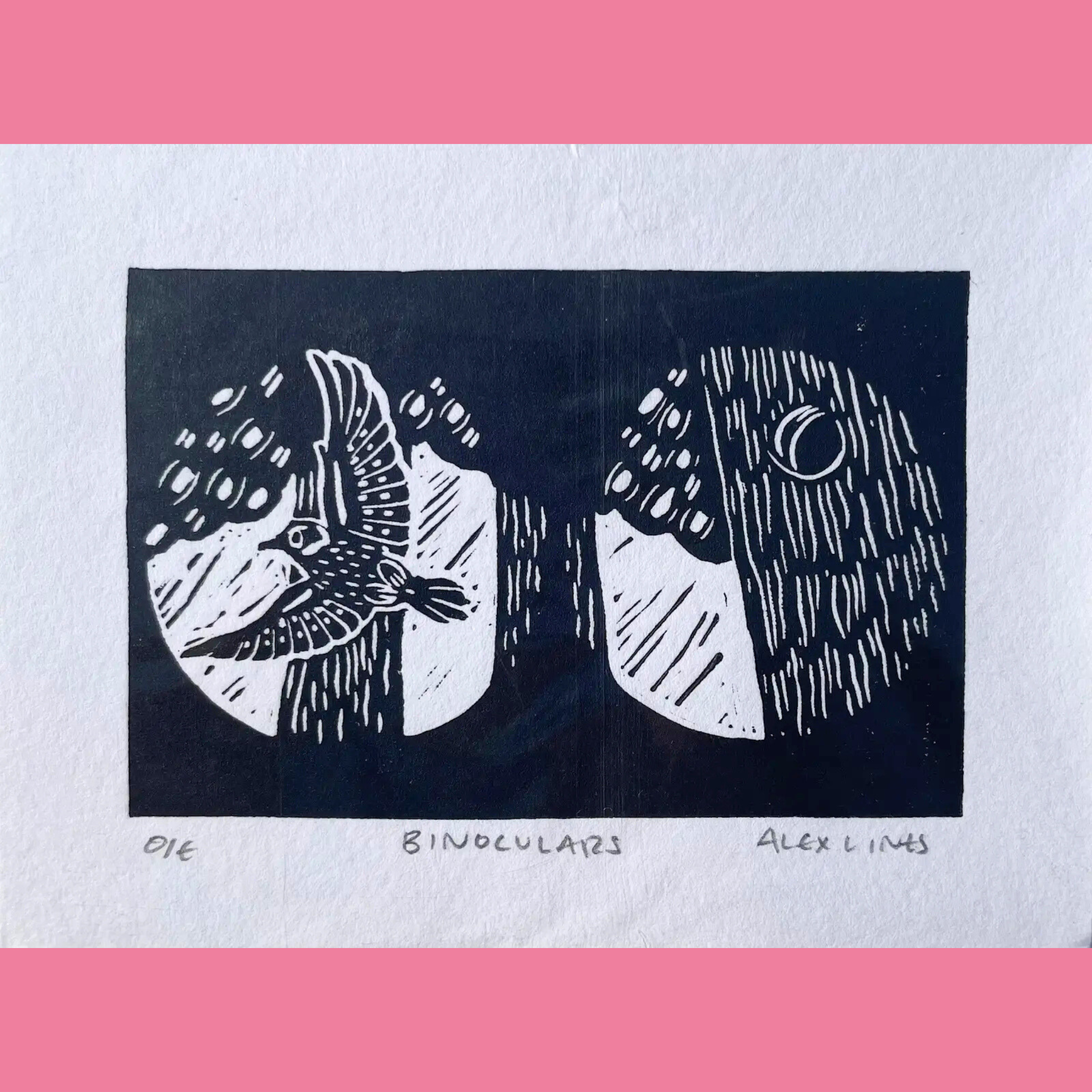A black-and-white linocut print shows a pair of large binoculars viewed from the front, with the left lens containing a detailed flying bird with outstretched wings and the right lens featuring a simple crescent moon against a dark background. The artwork is titled "BINOCULARS" and signed by "ALEX LINTS", printed on white paper and matted with a bright pink border surrounding the image.