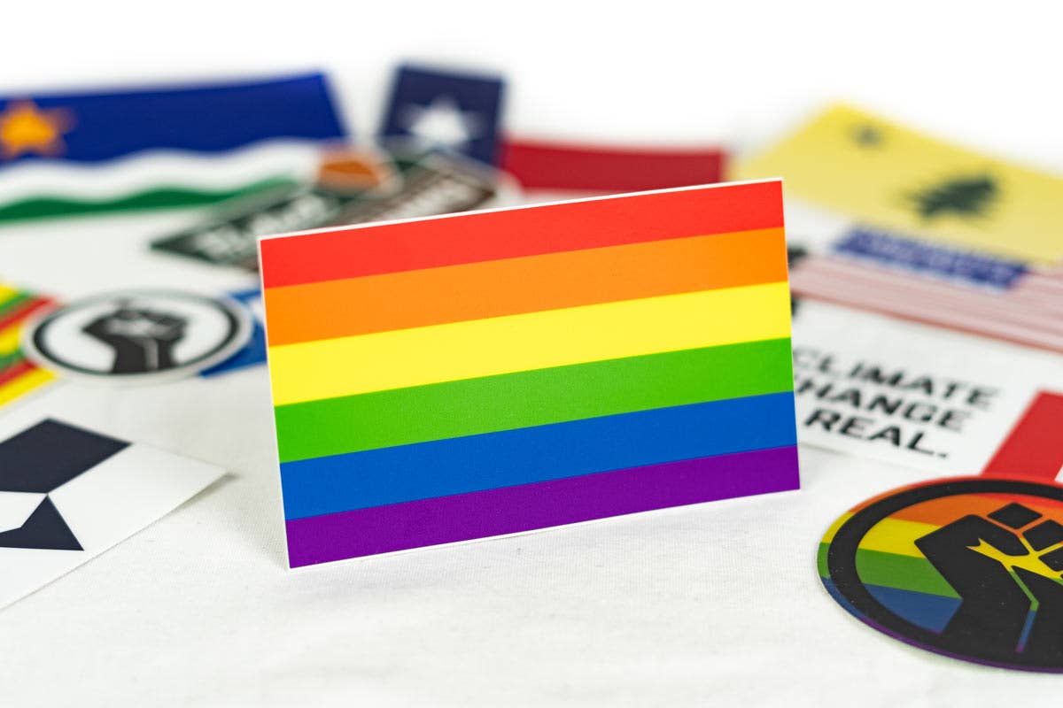 True to the original pride flag design popularized by artist Gilbert Baker in 1978, just in sticker form! Sticker ready for sticking on laptops, water bottles, your car, or anywhere else you can think of. 4.2" x 2.5"