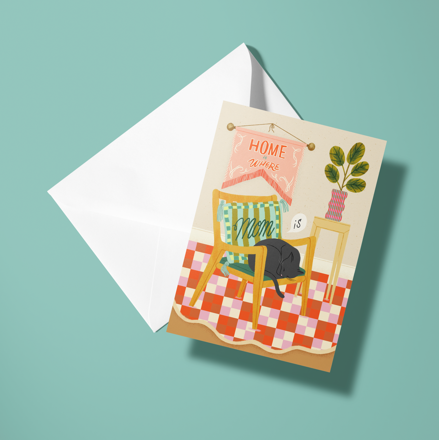 Greeting card with illustration of a chair and table on a checkered tablecloth, with a white envelope.