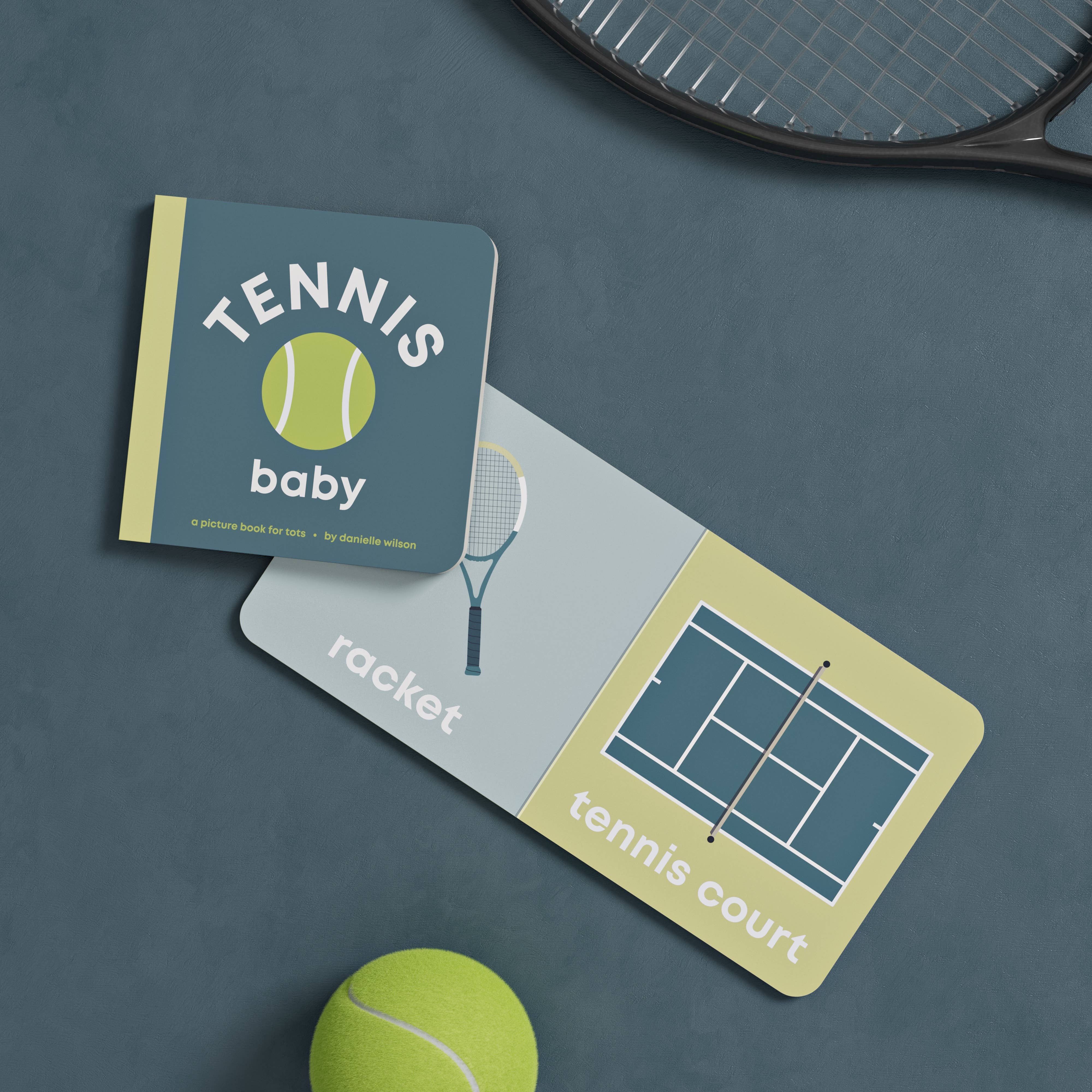 Children's book titled 'Tennis Baby' with tennis-themed illustrations on a dark surface.