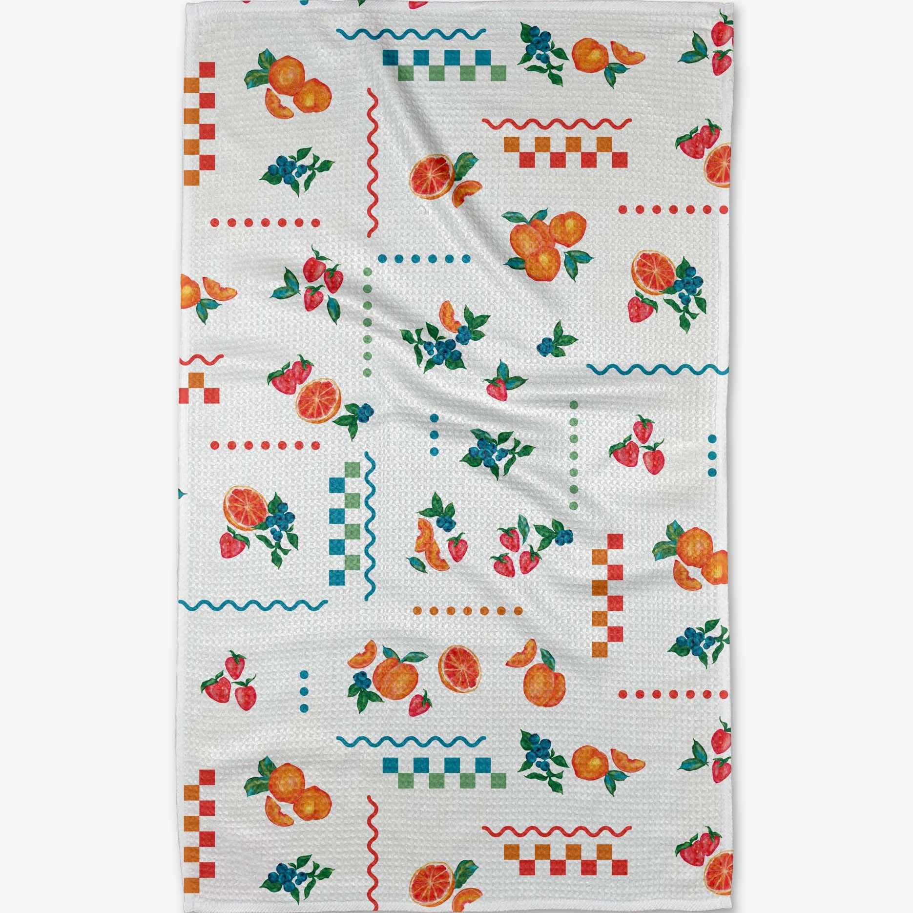 Patterned towel with colorful fruit and geometric designs on a white background Tea Towel