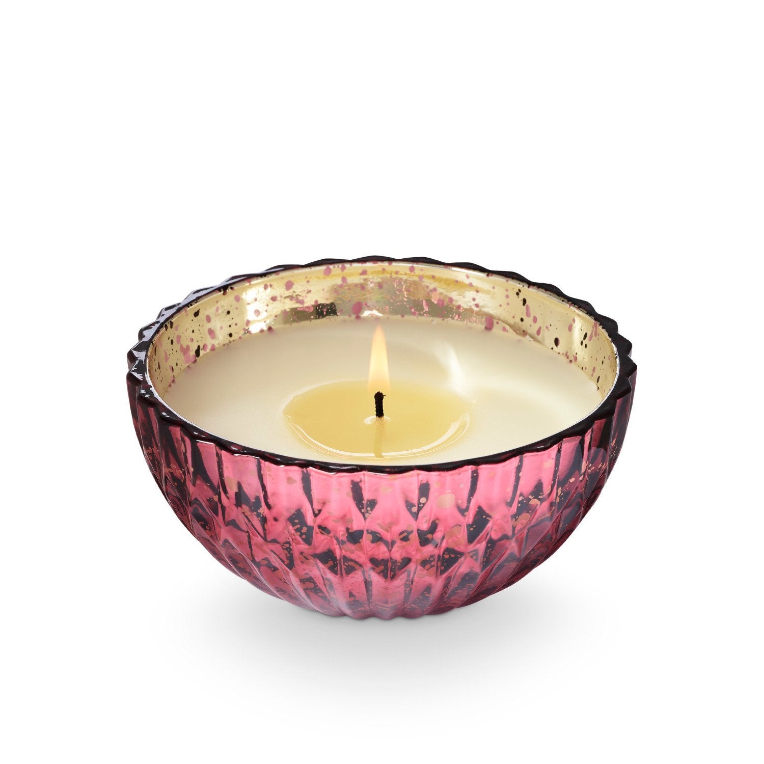 Candle in a decorative pink holder on a white background