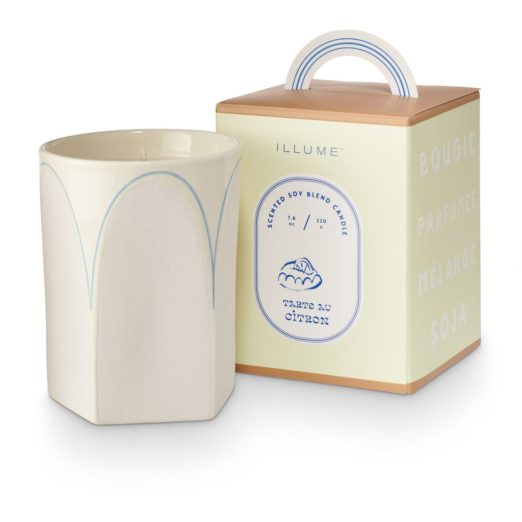  inspired box with a handle holds a simple white ceramic inside, accented with a delicate arched blue outline. Thoughtfully designed from wax to wick, put our candles anywhere and everywhere in the home or office. Explore the sweet treats of Paris with a decadent trip to the most charming bakery you’ve ever set eyes on 