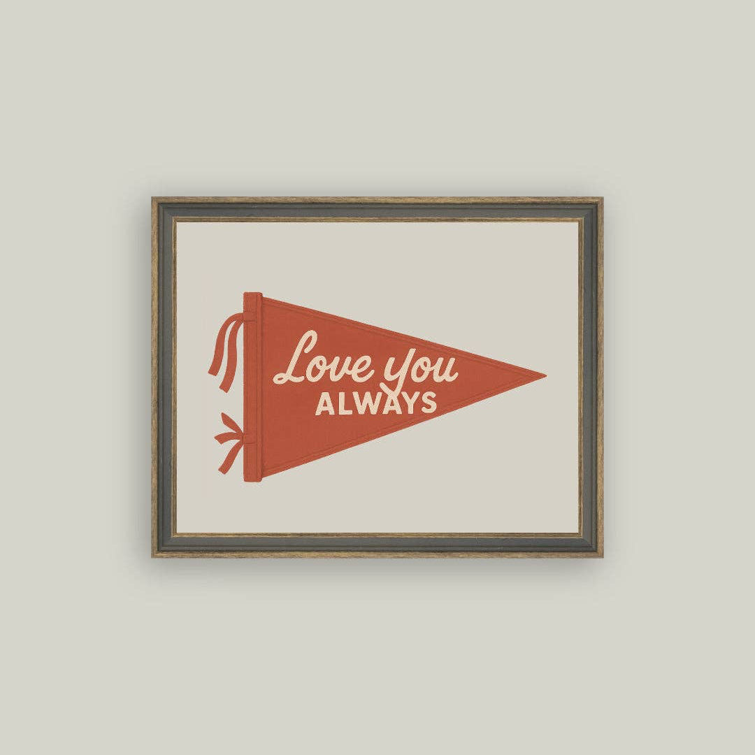Celebrate enduring affection with this charming framed art piece. Featuring "Love You Always" rendered in elegant script within a vintage-inspired pennant design, this 9x7 artwork brings warmth to any space. The rich red pennant sits nestled in an ornate frame with antique detailing, evoking timeless romance and nostalgia. Perfect for anniversaries, weddings, or as a heartfelt gift for someone special, this piece serves as a daily reminder of lasting love and cherished connections.