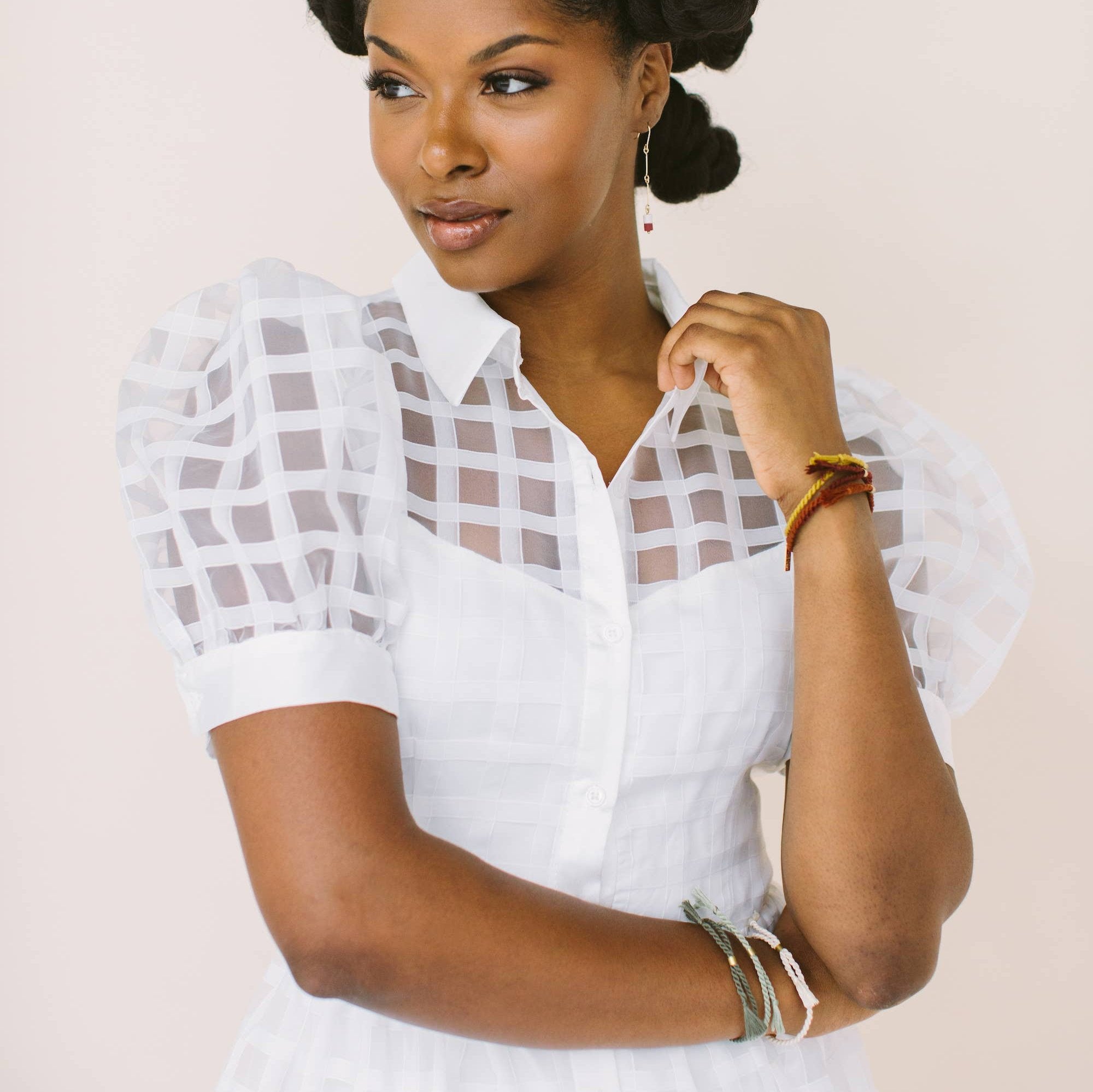 A delicate twist on Twenty Two West's crowd-favorite rope bracelets. The rope is hand spun from a single hue of cotton threads to create this soft and comfortable adjustable bracelet. Wear them individually or collect them all to mix-and-match in a complementary stack! Eucalyptus color.