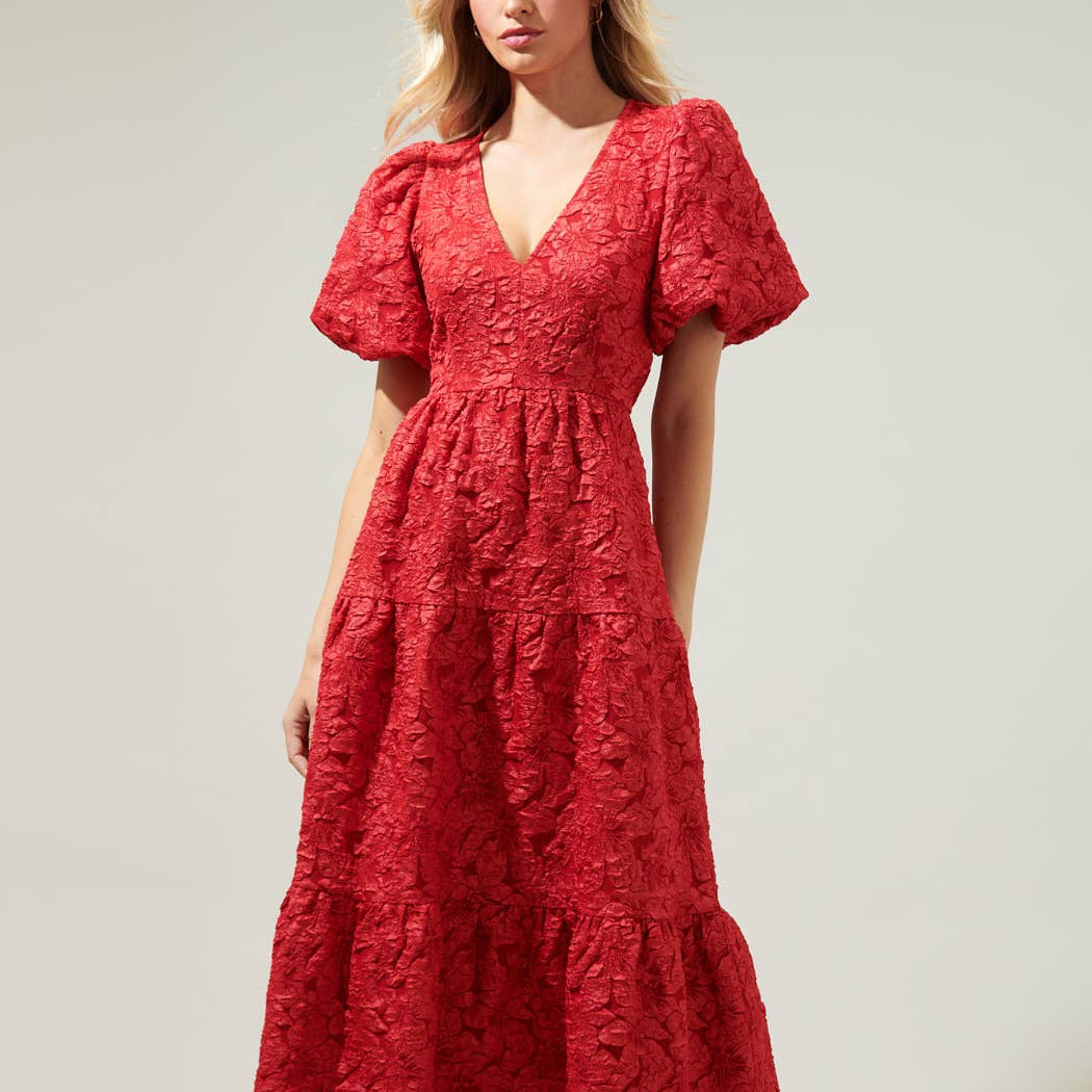 Beautiful days deserve beautiful style like the Arielle Luna Poplin Floral Maxi Dress! Made from a lightweight fabric, it features a shallow v neckline with floral details all down. The puff balloon sleeves and open back sit on the tiered bottom skirt. Pair the look with white or nude mules and you're good to go.
Details:
Puff sleeves
V-neckline
Open back
Tiered
Model is 5'8" and wearing size XS
Measurements taken from size S - Chest: 17 1/4" - Length: 54 1/2"
Color: Red