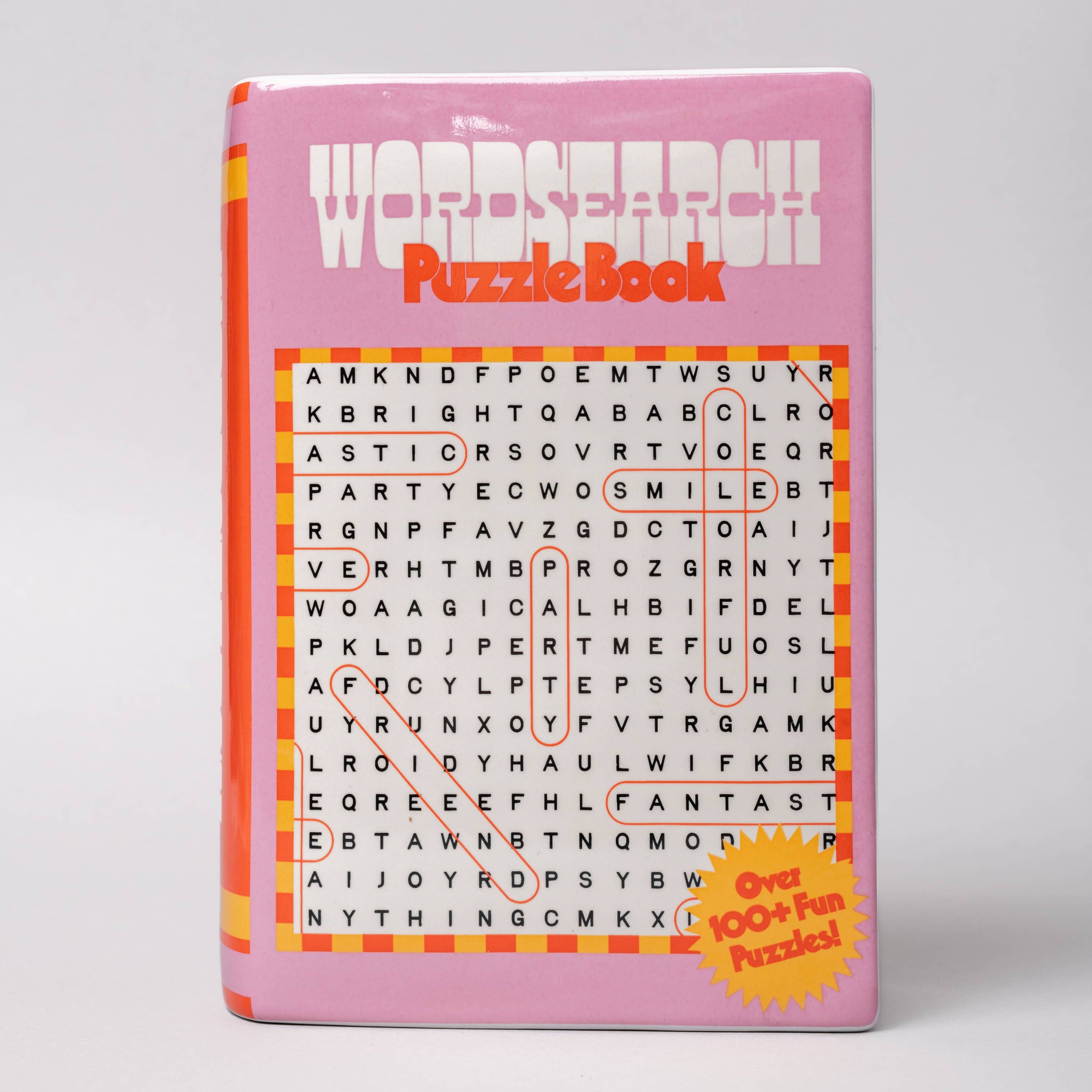 Pink puzzle VASE with word search design on a light gray background
