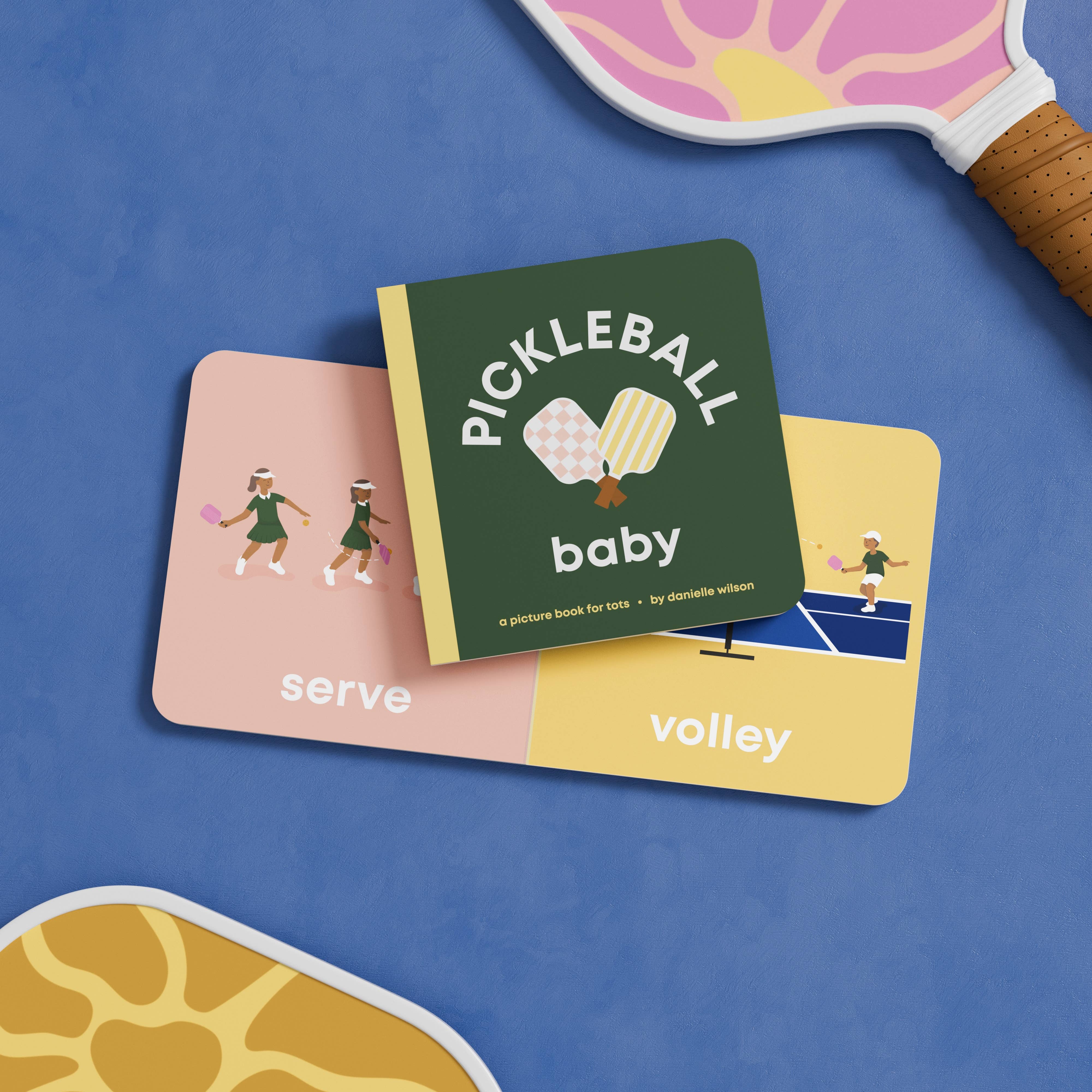 Children's book titled 'Pickleball Baby' on a blue background with paddle and ball.