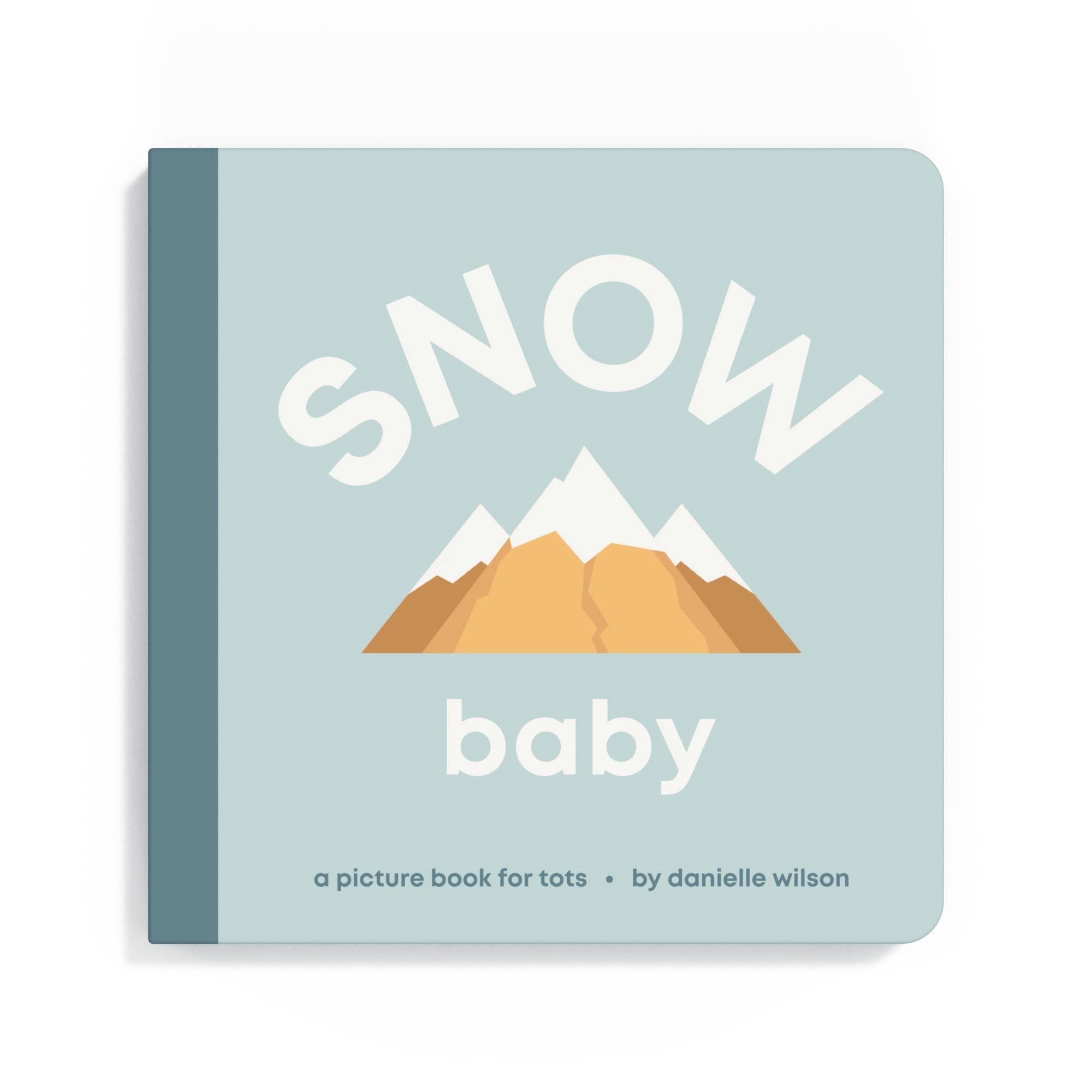 Book titled 'Snow Baby' with mountain illustration on a light blue background