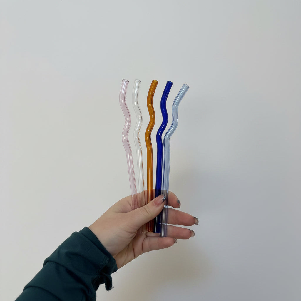5 wavy glass straws. Pink, clear, orange, blue, and light blue.