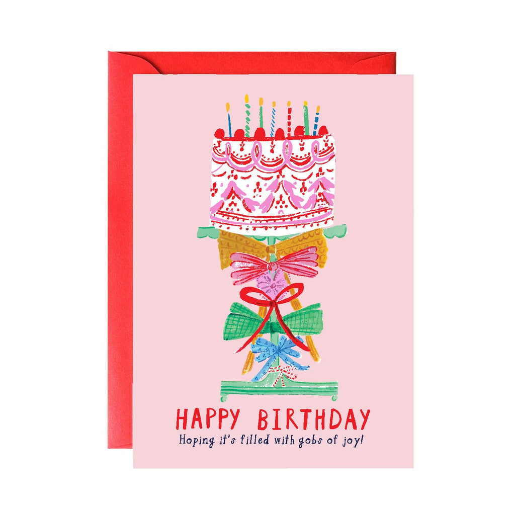 Surprise your loved ones with this adorable Ribbons On the Cake birthday greeting card! This card is sure to bring a smile to anyone's face. With charming ribbons and a playful design, it's the perfect way to say "happy birthday" in style.