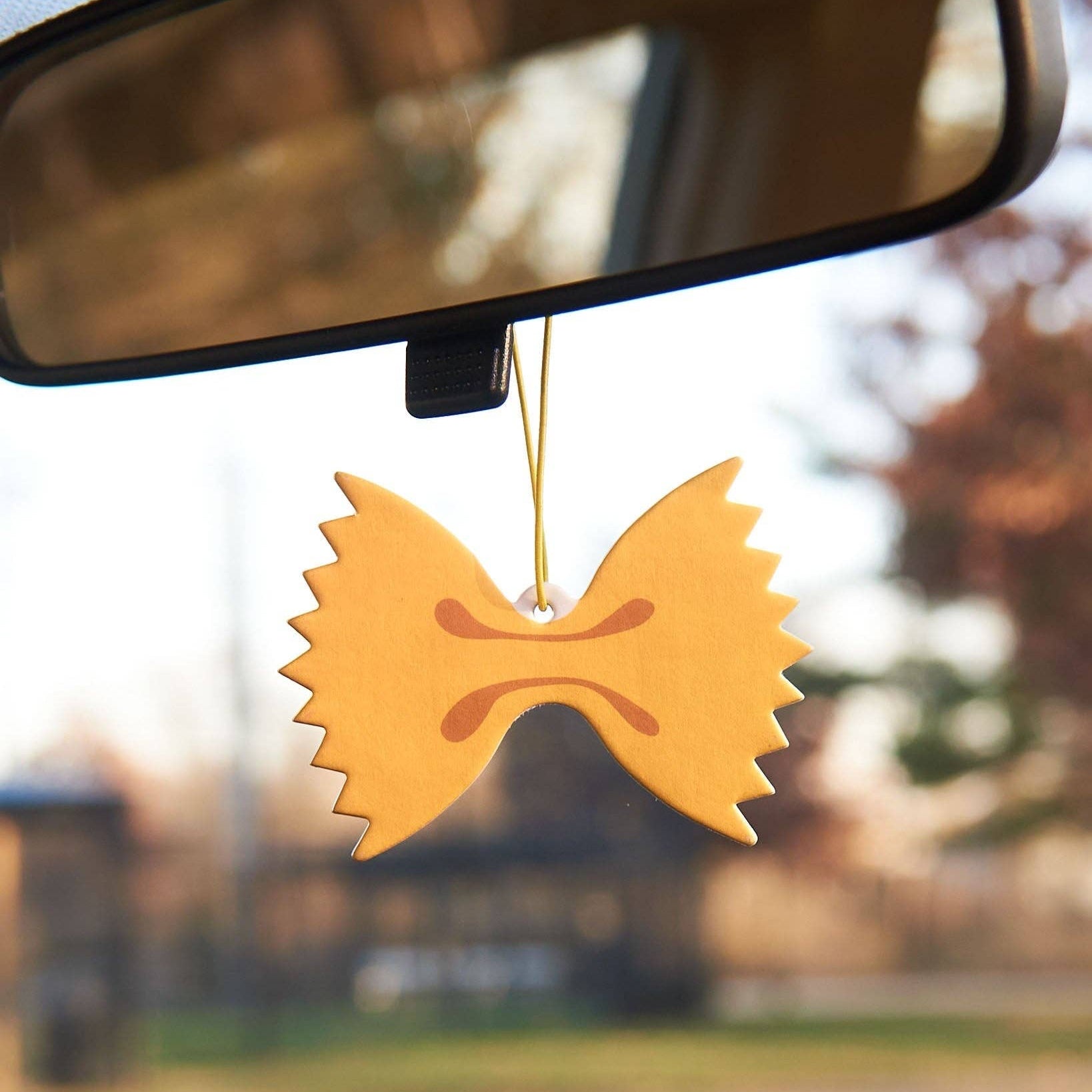 Show your pasta pride with this giant farfalle (bowtie pasta to us pleebs). Lemon scented. Printed on a thick and durable paper and scented with high quality essential oils, our air fresheners are great for a quick refresh of your car, office, or home. Plus, they’re a cute ornament to keep around after the scent has faded.
Details:
Measures 3"
Scent: Lemon Scent
Double sided
Designed and packaged in Columbus, OH; made in China
Artwork by Meghan Hopkins Sokorai