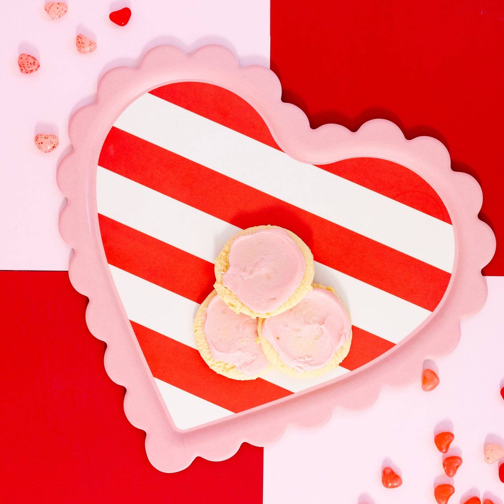 Sweeten up your Valentine's Day with our Scalloped Striped Heart Tray! Made from bamboo, this tray is perfect for serving snacks or displaying all your heart-shaped treats. Show some love with this unique scalloped design, guaranteed to make hearts flutter.
Details:
15” x 13¾” bamboo shaped tray
Heart shaped
Food safe
Dishwasher safe
Eco-friendly and sustainable
Do not microwave