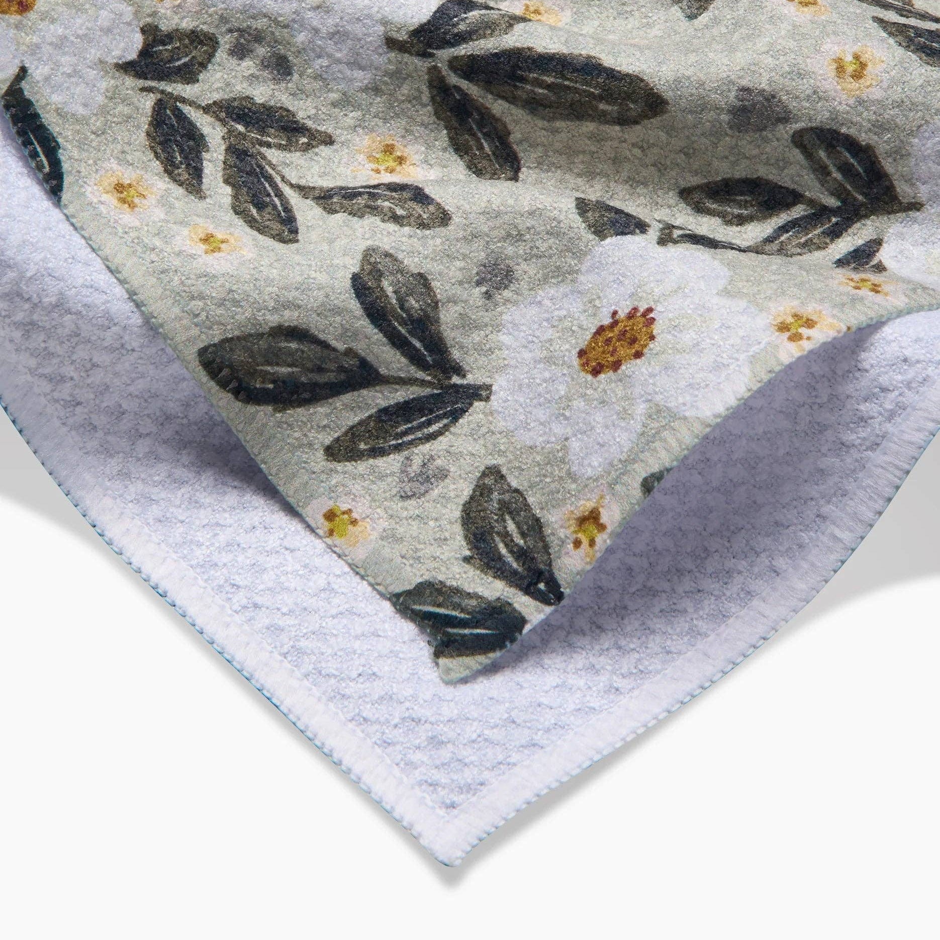 Floral patterned rug with a gray background
