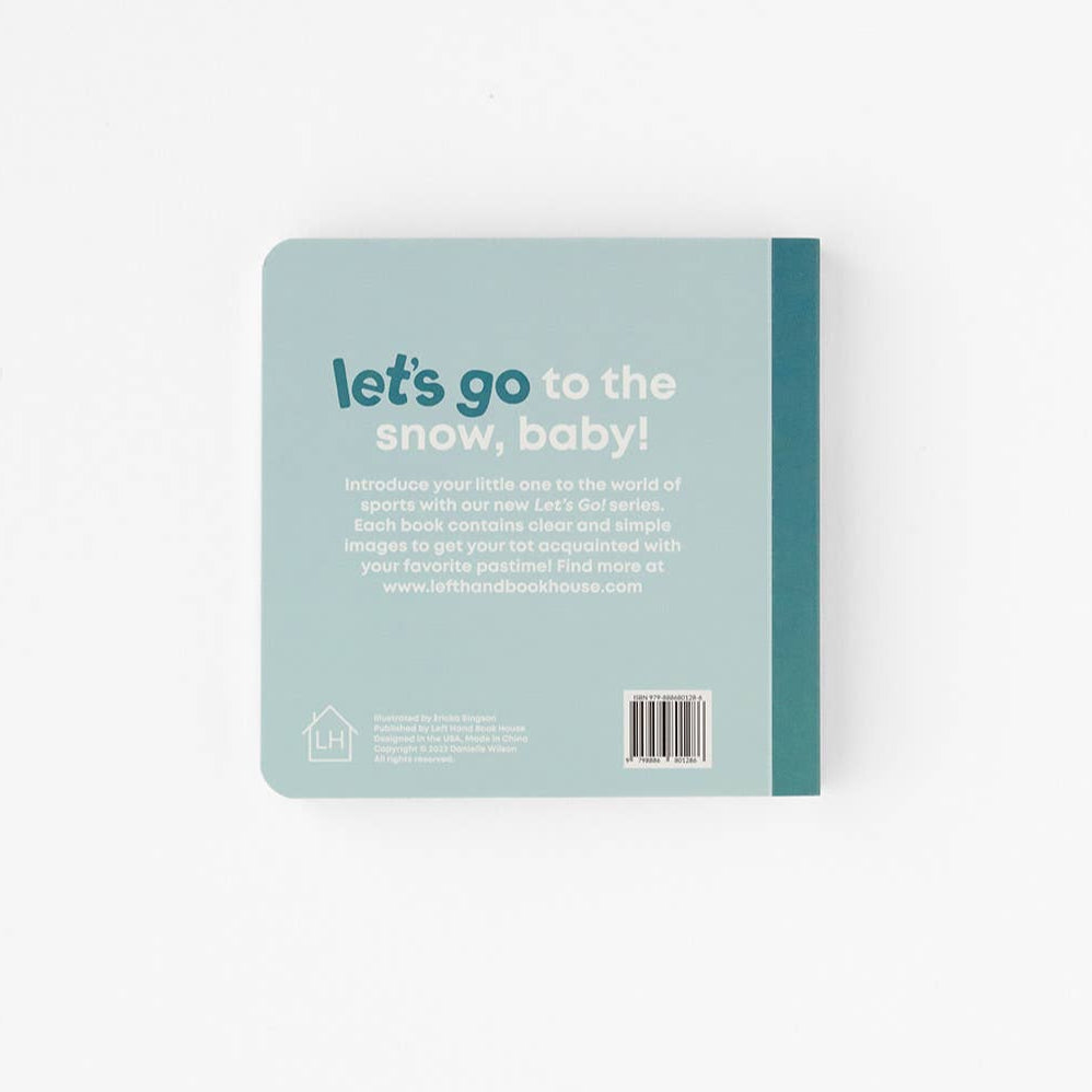 Book with text 'let's go to the snow, baby!' on a light blue background