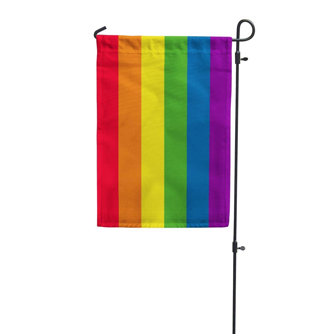 Garden flag with the traditional six stripe pride flag design popularized by artist Gilbert Baker in 1978. These garden flags are a thick double-sided construction and double-stitched all around. They have a pole pocket along the top to fit any standard garden flag stake (not included). 18" x 12"
