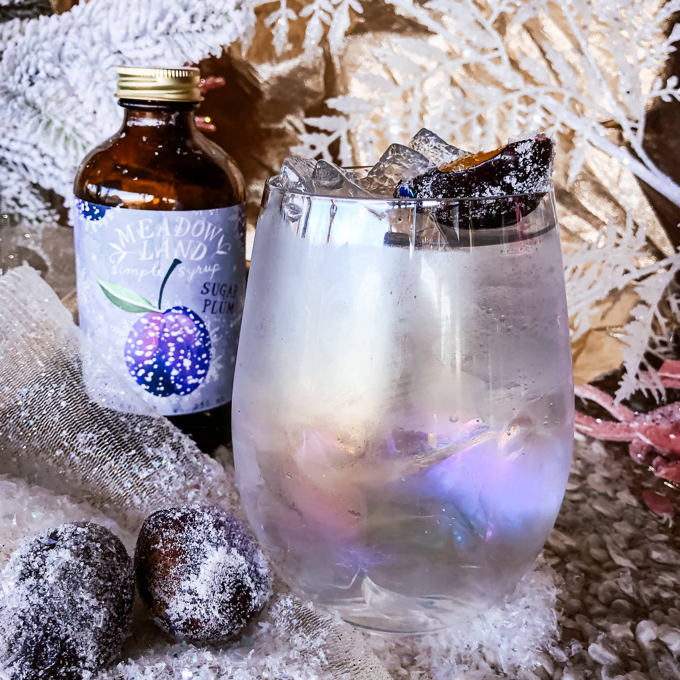 This Oregon-made, handcrafted simple syrup is a festive addition to any wintry cocktail. Also makes a delicious glaze for pastries!
Details:
Tasting Notes: a frosty sugared plum, glittering snow, enchantment.
Ingredients: pure cane sugar, plum juice, cream of tartar. 236 ml (8 FL. OZ) of magical goodness!
We use locally harvested and organic ingredients whenever possible.
Non-GMO, no artificial colors.
Once opened, keep refrigerated for optimum freshness
Retail size: 236 ml (8 FL. OZ) of magical goodness!