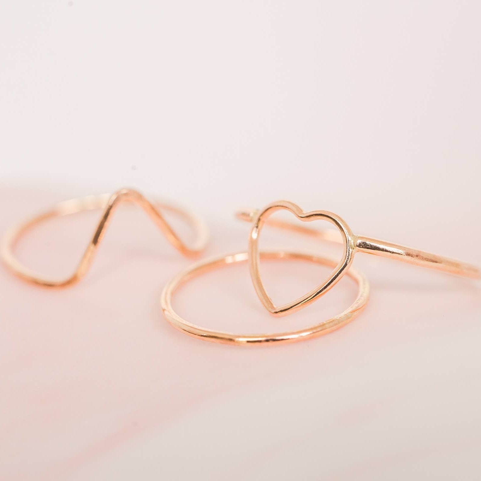 This delicate Heart Ring is crafted in goldfill, showcasing a charming heart design. The warm tone of the goldfill complements any skin type, making it perfect for everyday wear. Show your love and add a touch of elegance to your outfit with this stunning Heart Ring.