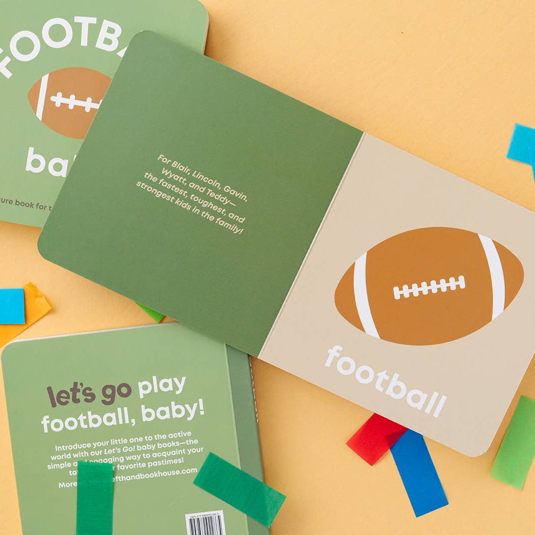 Children's book titled 'Let's go play football, baby!' with colorful pages on a yellow background.