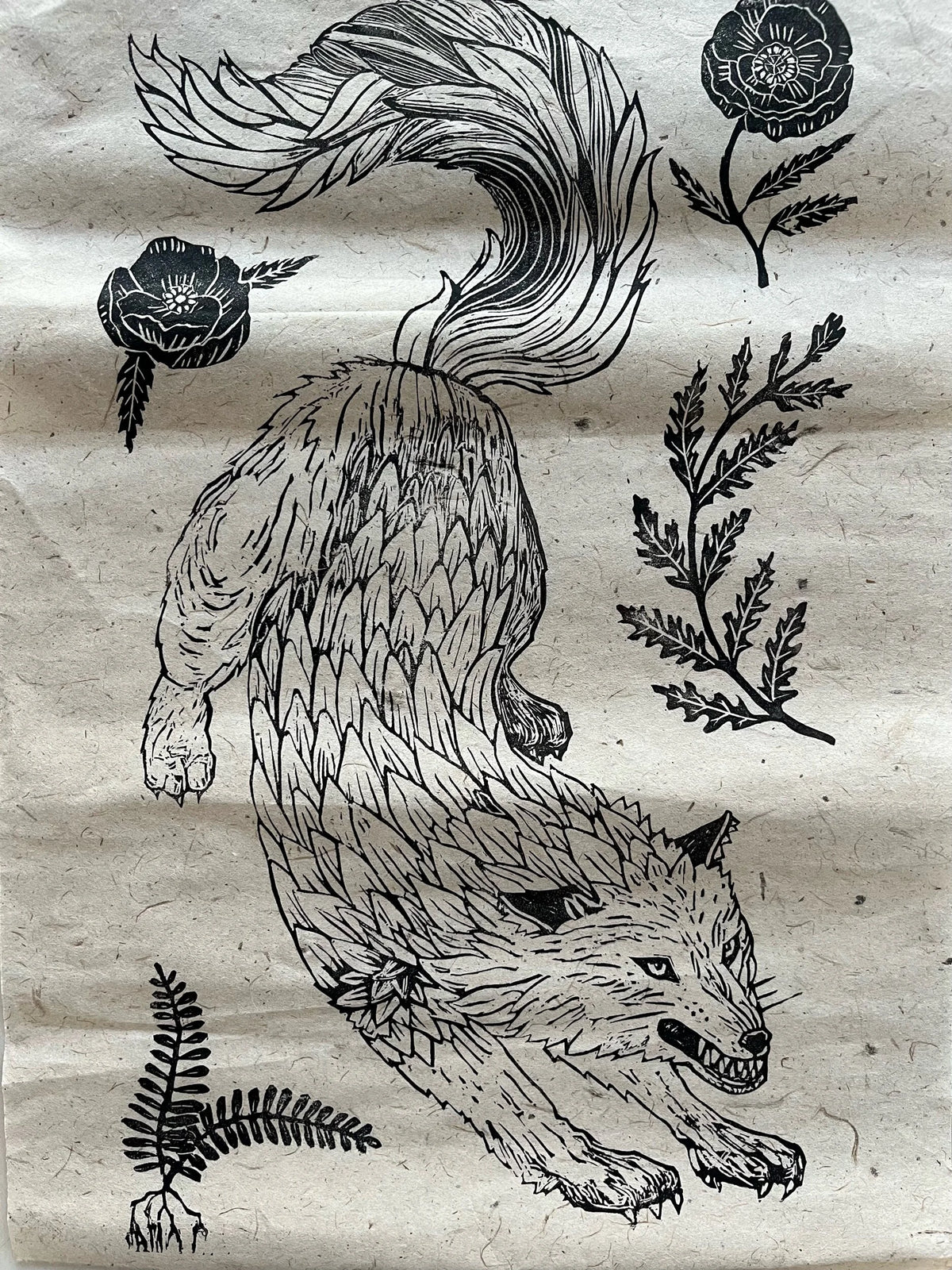 wolf print on rough paper.