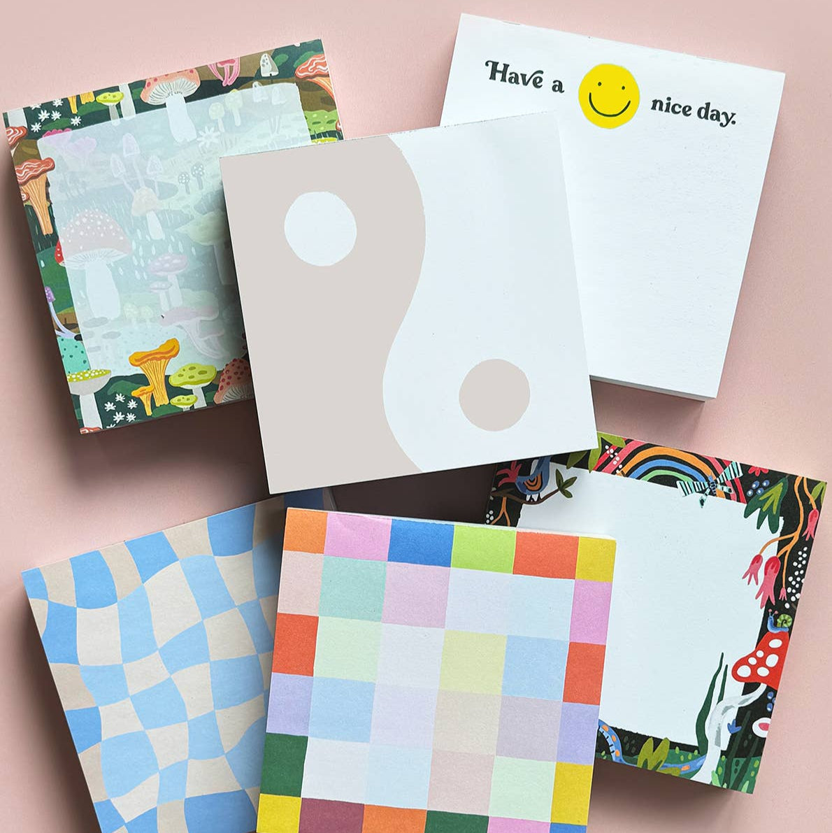 A fantasy-colored hand painted rainbow adorns a spacious writing sheet on this tear-off notepad. With 200 colorful, hand painted sheets, this jumbo notepad will go the distance! Keep your daily task list fanciful, or pen a message snail-mail style to brighten someone’s day.
• 200 TEAR-OFF SHEETS
• 6″ X 6″ notepad