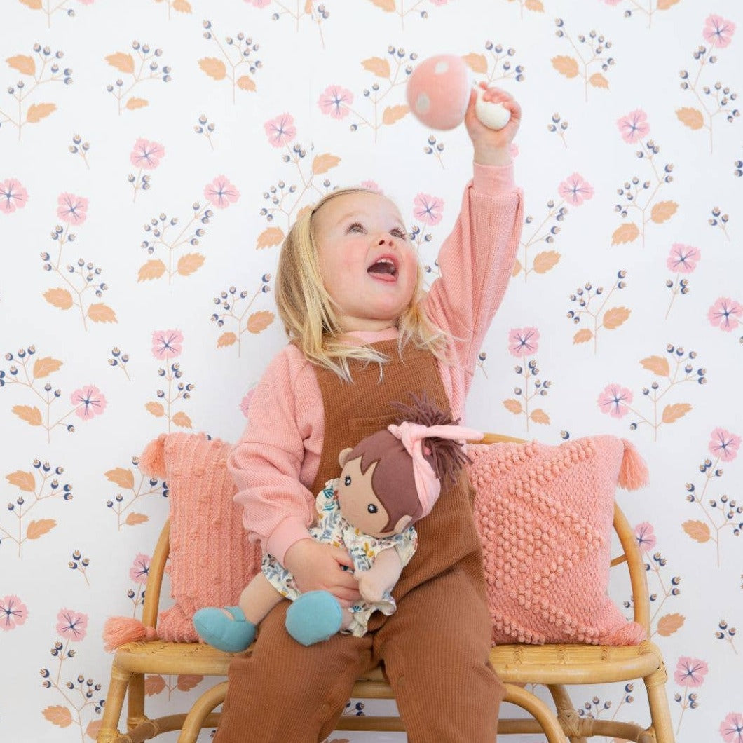 Let this Mushroom Rattle add a touch of whimsy to your baby's toy collection. Made of soft pink velour, it's perfect for tiny hands to shake and play with. It also makes a gentle rattling sound to stimulate sensory development. It's the perfect blend of cute and practical. Fungi never looked so fun! * 100% GOTS certified organic cotton * Filled with organic cotton and naturally hypoallergenic corn fiber * Securely sewn plastic-free, BPA-free, phthalate-free rattle * 5x4 inches