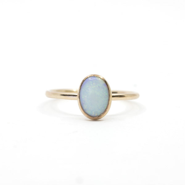 White Opal Oval Ring in Gold