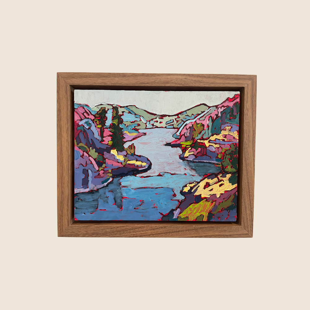 A colorful landscape mixed media painting of Lake Tahoe, with the cool green mountains in the background, and wide lake flowing from the foreground through the middle of the painting, with colorful foliage filled hills on either side of the lake. The colors range from cool blues and purples,to light pinks, yellow, to dark greens, and reds.