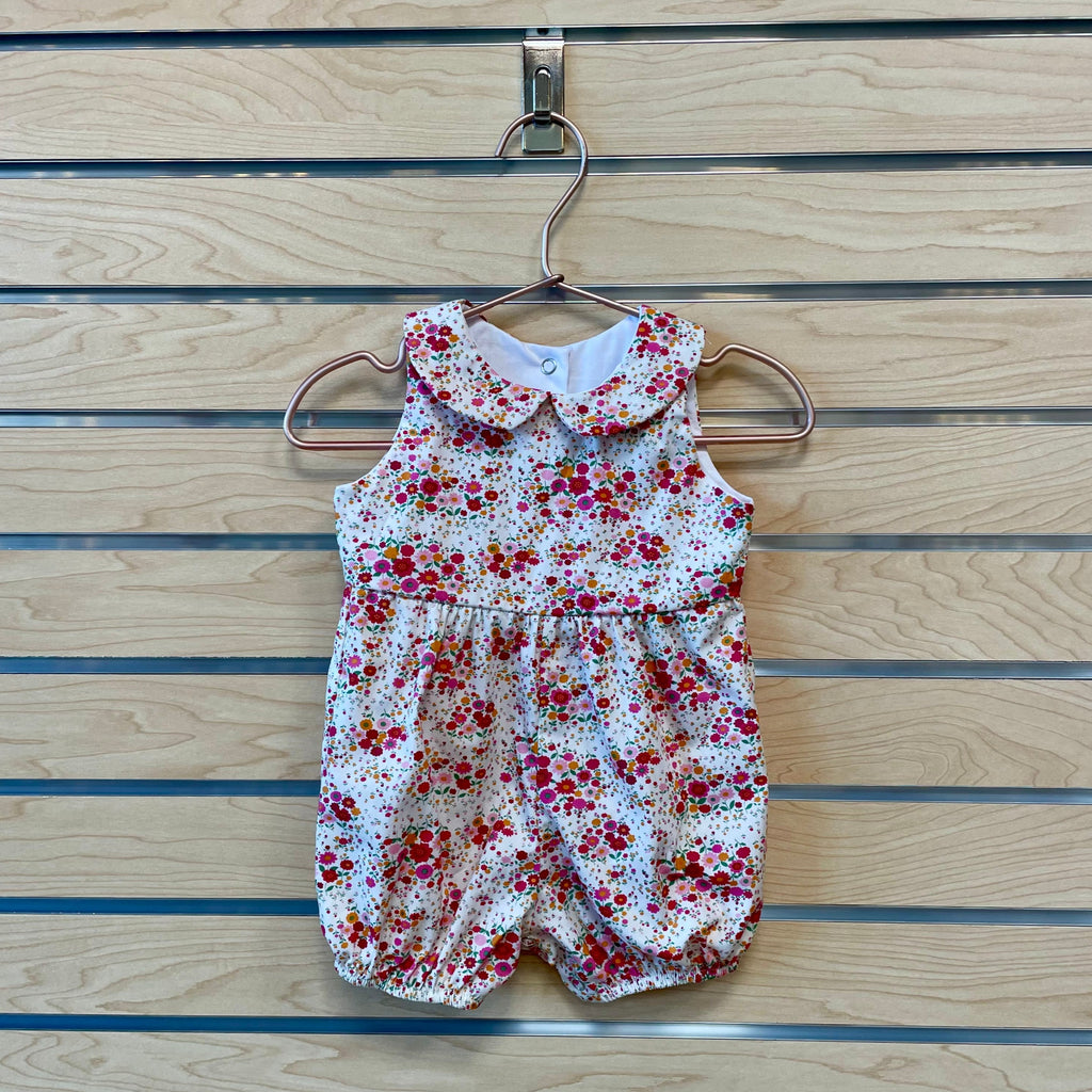 Dress up your little one in the Harper Romper and have everyone petal-ing all over your stylish babe! This beauty features Petite Garden. Pink and is sure to make your kiddo look hip and cool! Put your mini in the Harper and everyone will be buzzing like a bee!