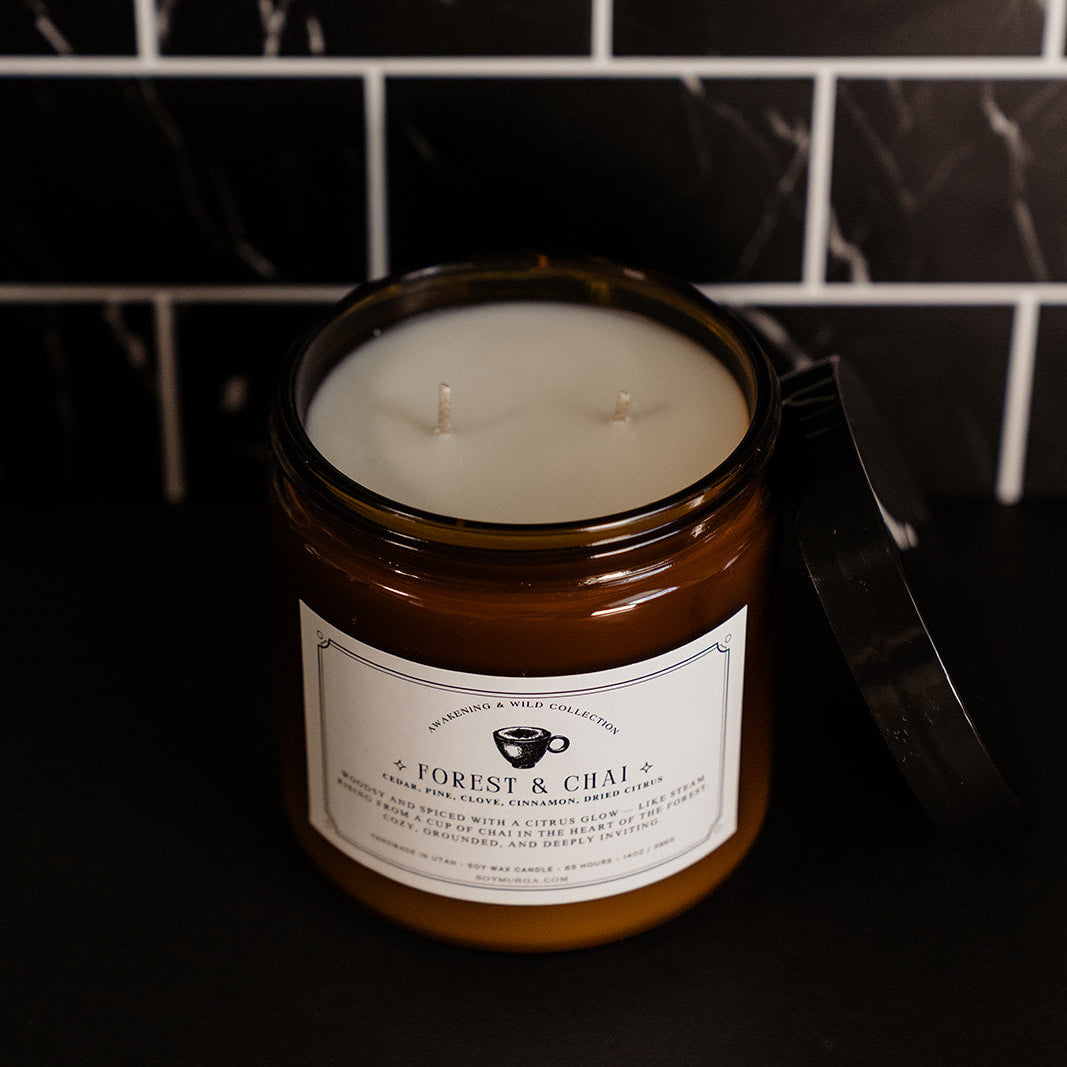 The 14oz candle with two wicks in an amber glass jar.