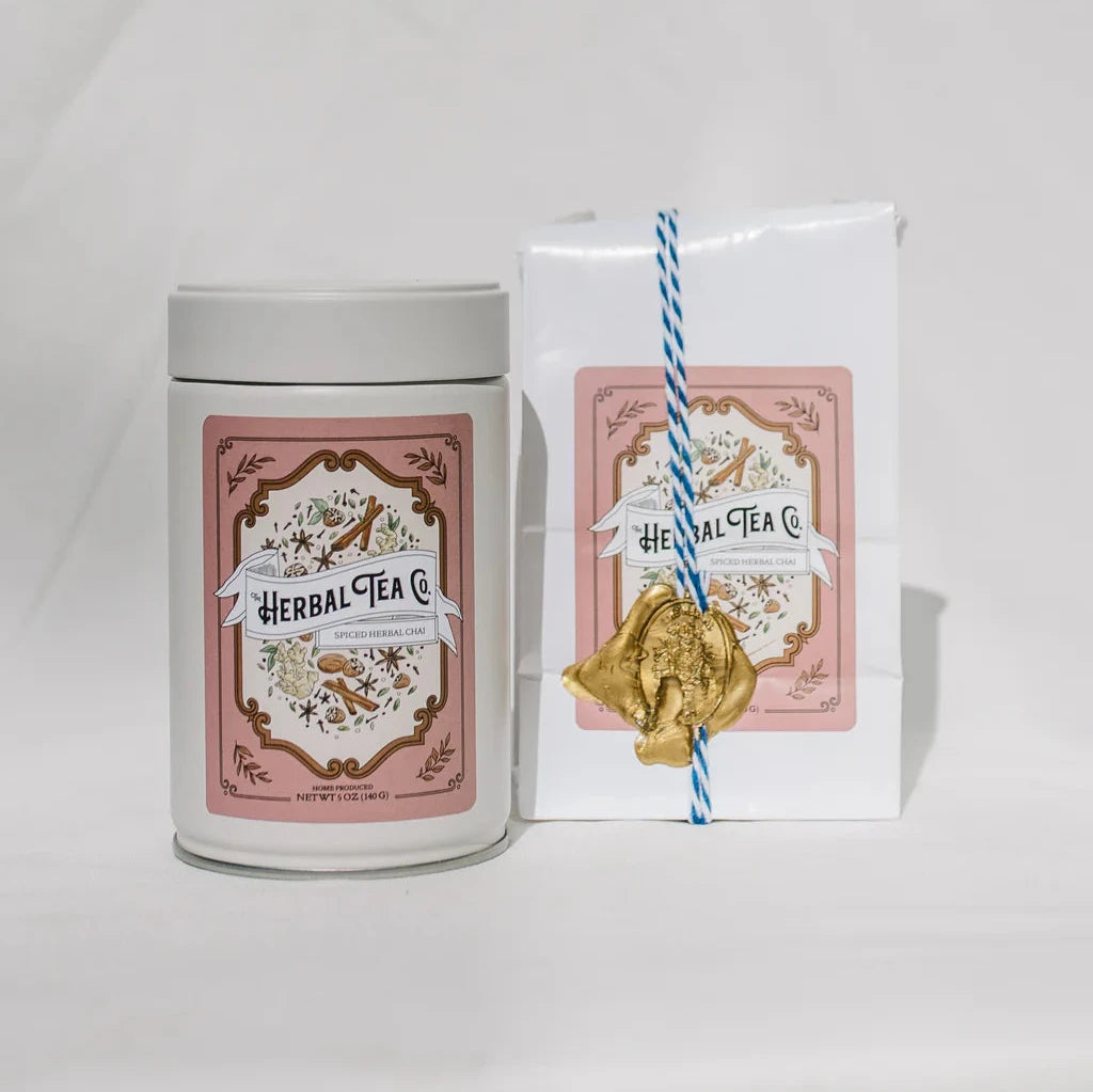 Spiced Herbal Chai tin and refill bag with The Herbal Tea Co. logo