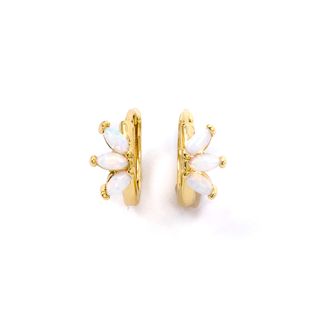 Gold huggies standing vertically with trio of oval opalite stones exposed. Pictured against a white back ground.