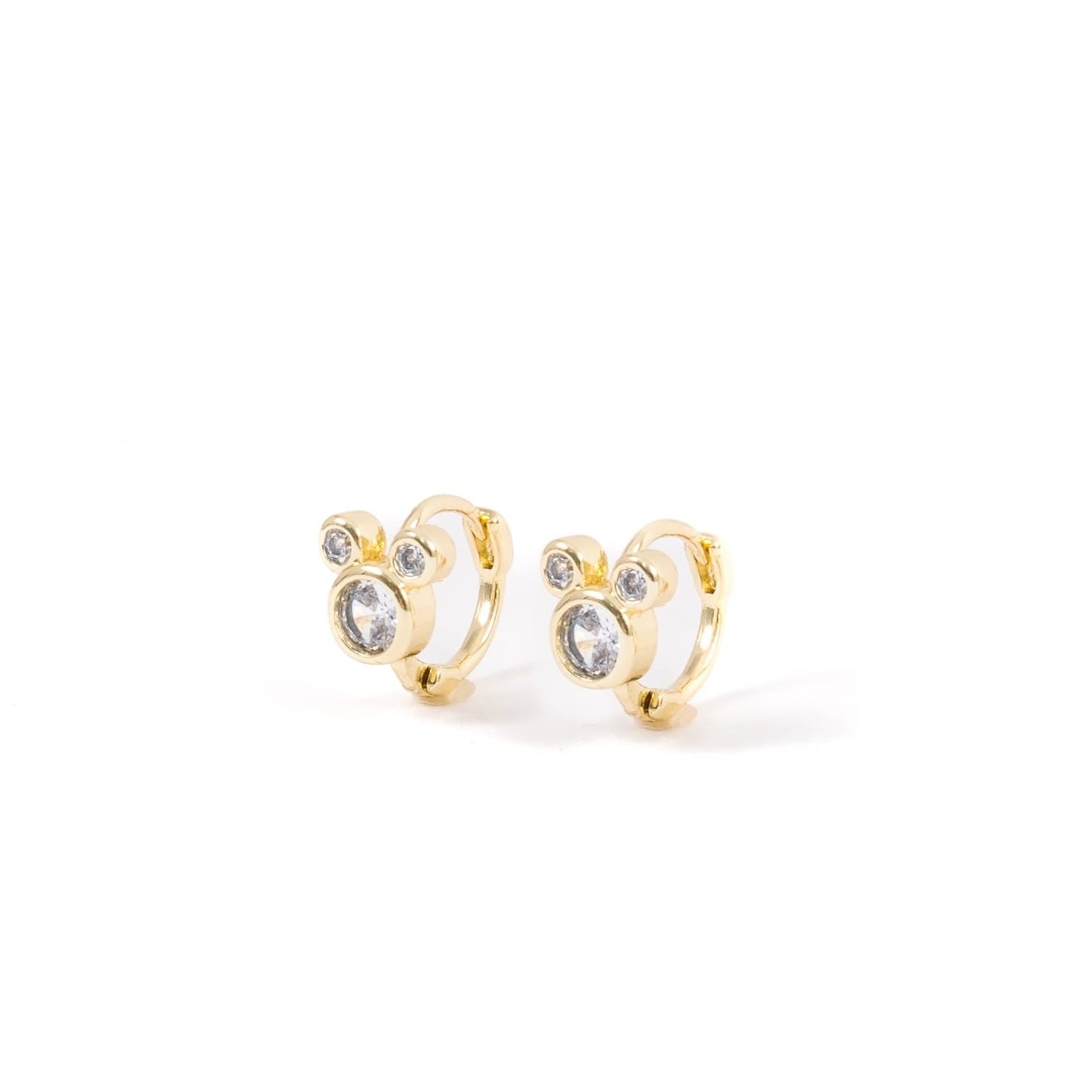 Gold filled huggie earrings that hinge and have a cz diamond shape of the iconic mickey mouse ears.