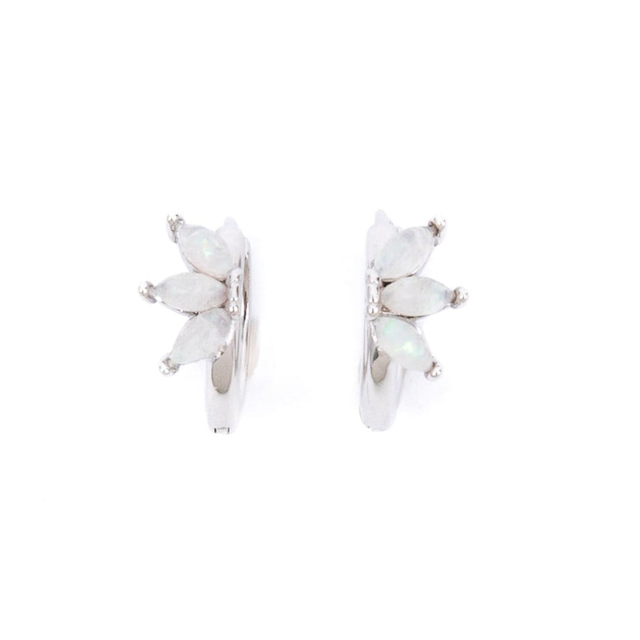 Silver huggies standing vertically with trio of oval opalite stones exposed. Pictured against a white back ground.