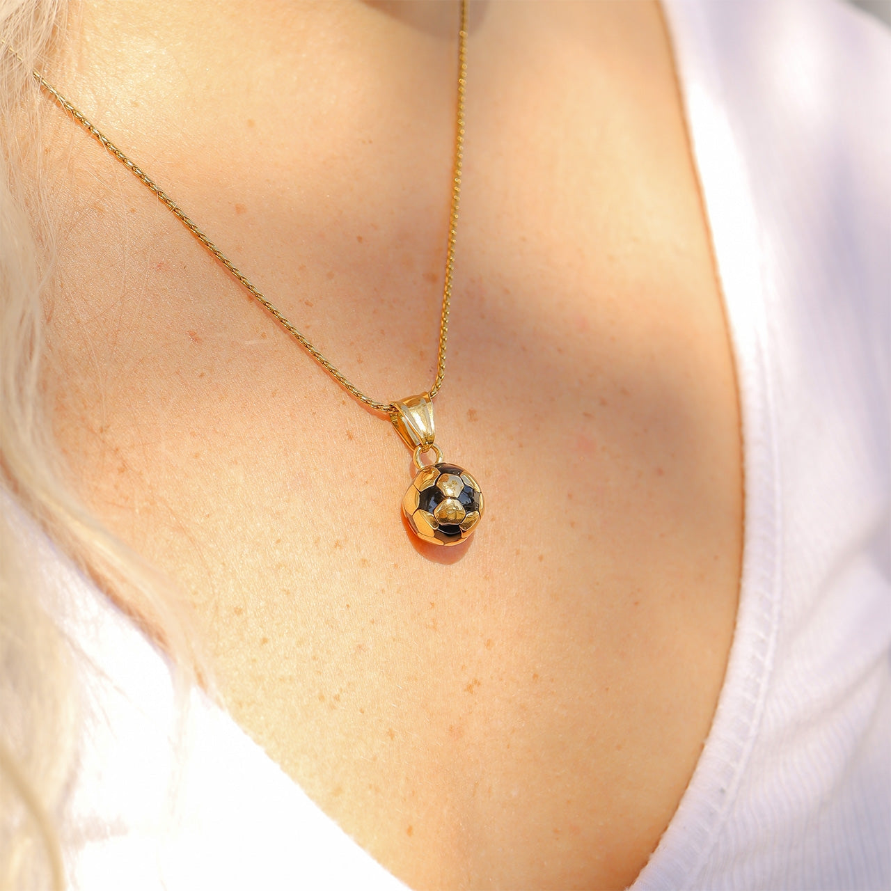Score big with our striking 18K Gold Stainless Steel 3D Soccer Ball Charm, a must-have addition for sports lovers! Crafted from high-quality stainless steel and finished with a luxurious 18K gold plating, this charm offers both durability and elegance. Its lightweight design makes it perfect for adding to bracelets, necklaces, or even keychains!