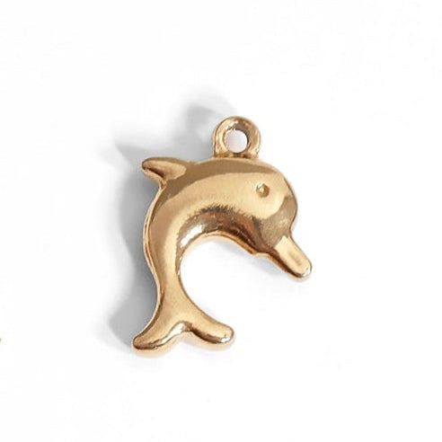 Add a touch of fun to your jewelry collection with our Gold Dolphin Charm. This nautical-inspired charm features a vibrant gold color that will add a pop of personality to any outfit. Perfect for those who love a playful, beachy vibe!