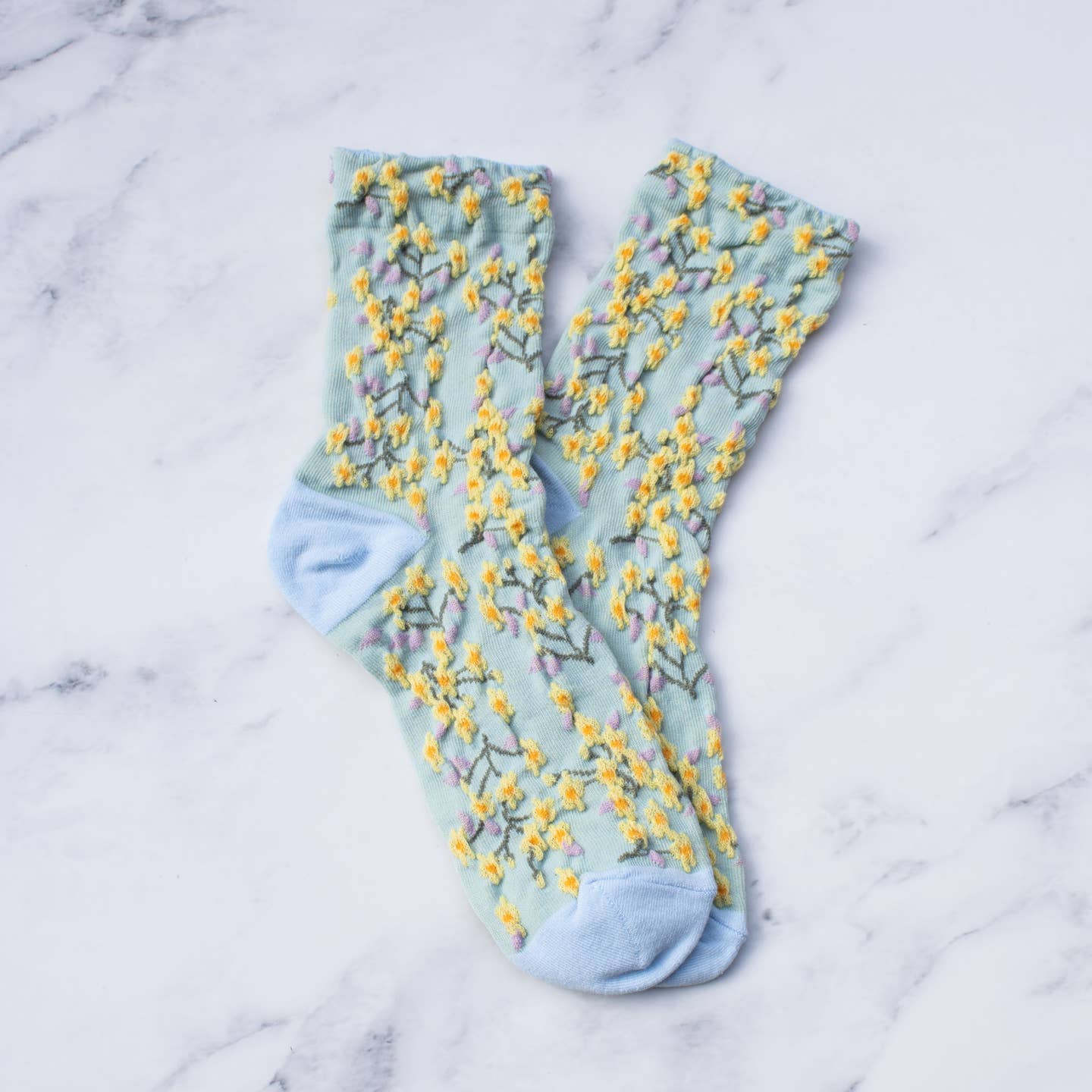 Perfect for adding a vintage and romantic touch to your wardrobe. These socks are not only stylish, but also comfortable and high-quality. Elevate any outfit with these must-have statement pieces.