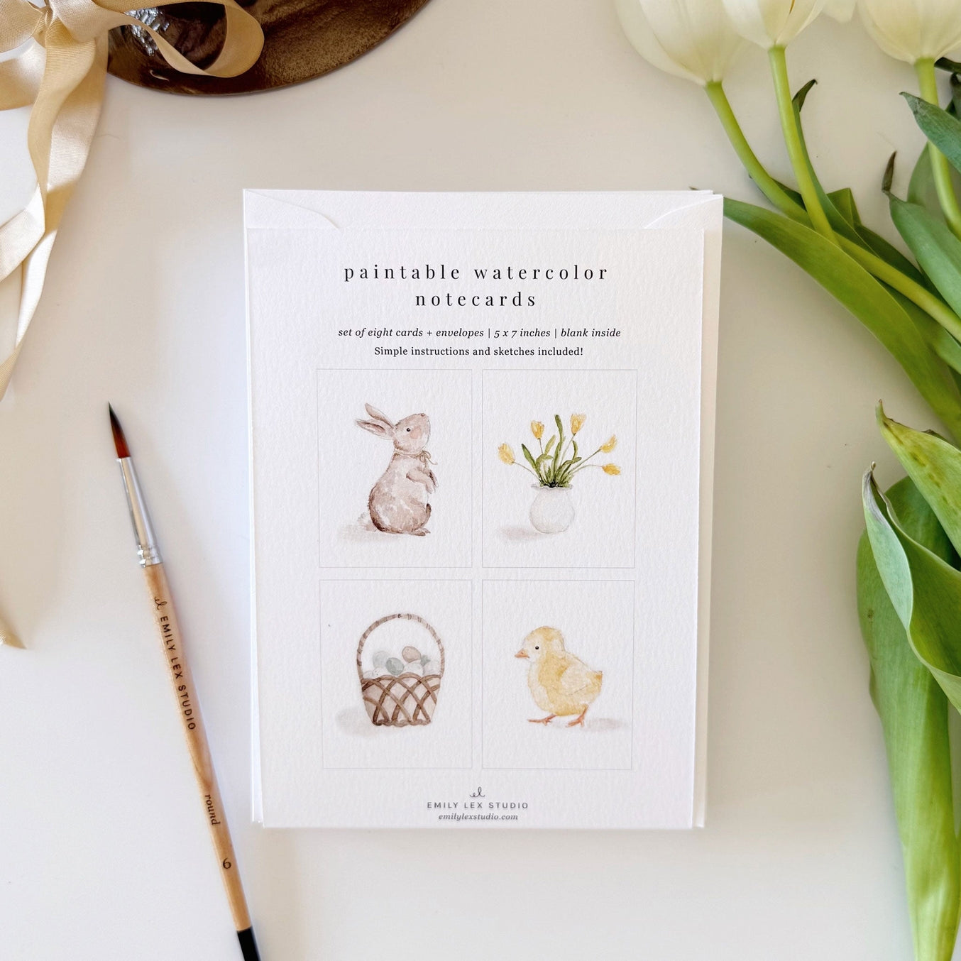 Paint your own special cards to send to loved ones! Sketches are printed on the front of each card with simple instructions for you to paint in with watercolors. You'll receive eight cards with two of each illustration: bunny, easter basket, chick and tulips. Perfect for artists of all ages!