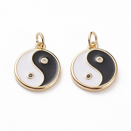 Add some balance and harmony to your style with our Yin Yang Charm. This beautiful enamel charm features a striking yin yang design with gold lining, perfect for adding a touch of elegance to any bracelet or necklace. Embrace the duality of life with this versatile and meaningful accessory.