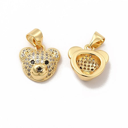Elevate your jewelry game with our Gold Sparkling Bear Head Charm. The stunning cubic zirconia adds a touch of sparkle to this bear head charm, which can be worn as a bracelet or necklace charm. Perfect for adding a touch of whimsy and sophistication to any outfit.