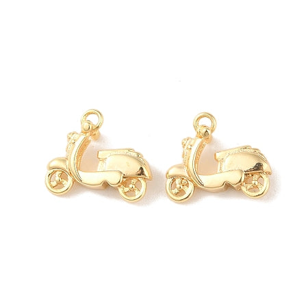 Travel in style and add a touch of elegance to your favorite accessory with our Gold Vespa Charm. The charming mini Vespa design in a lustrous gold color will elevate any bracelet or necklace, making it the perfect addition to your jewelry collection. Show off your love for travel and fashion with this versatile and eye-catching charm.