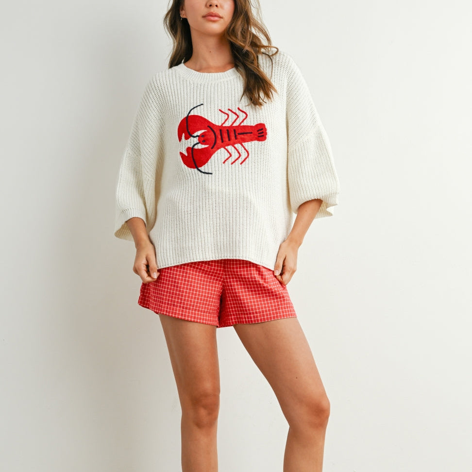 Stay stylish and comfortable with this Oversized Lobster Sweater. Designed for a relaxed fit, this cozy piece features a bold, eye-catching print that adds a fun and playful touch to any outfit. Perfect for layering or wearing on its own, it's an effortless choice for casual days and laid-back looks.